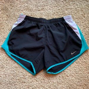 Black Nike running shorts